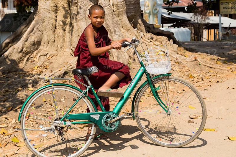 Monk on a bicycle at the Five-Day Market