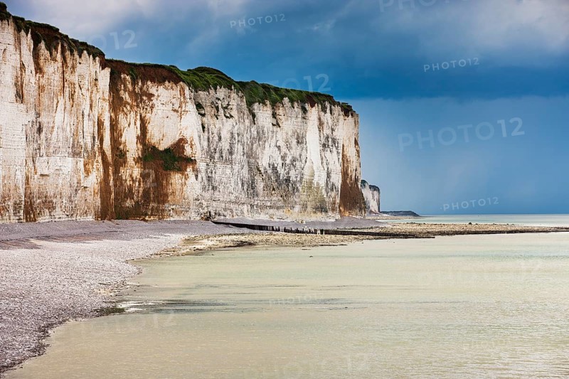Storm clouds over chalk cliffs on the coast near Saint-Valery-en-Caux