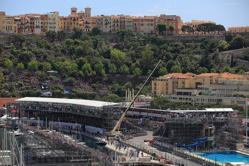 Pool and grandstands in front of Monaco's historic centre