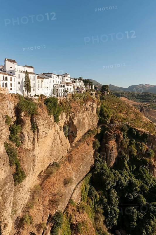 Whitewashed houses atop El Tajo Gorge Canyon