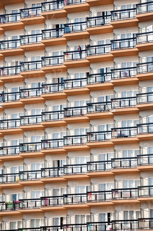 Rows of balconies on the facade of a large hotel complex in Torremolinos