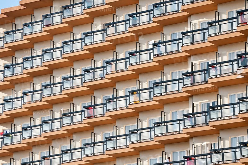 Rows of balconies on the facade of a large hotel complex in Torremolinos