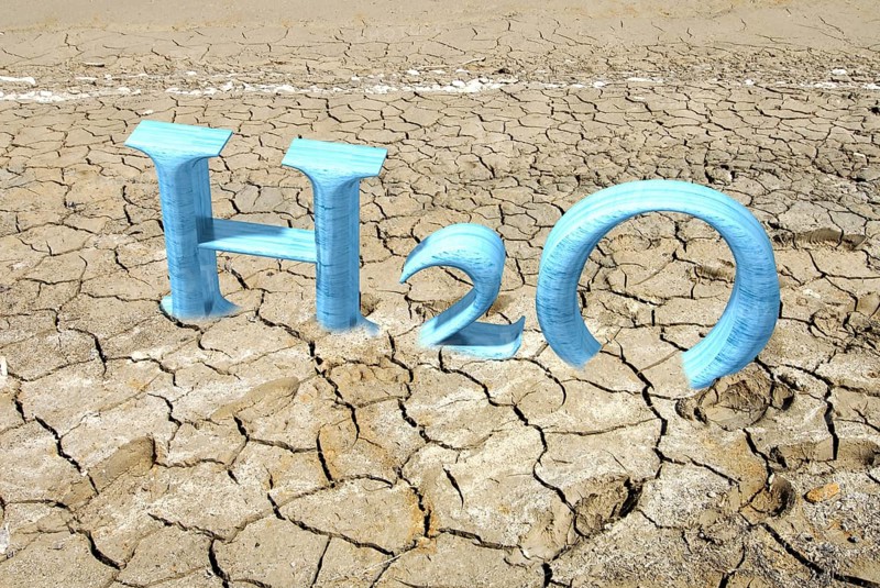 CGI of the letters H2O in cracked soil