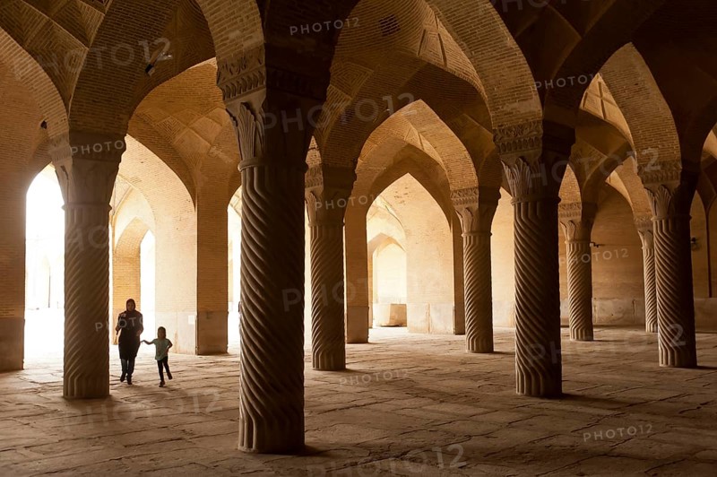 Mother with child in Vakil Mosque prayer hall