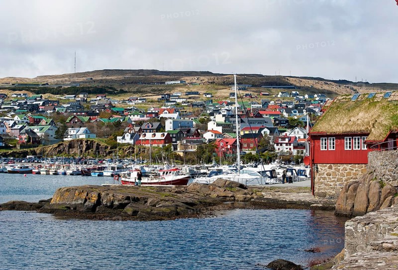 Colorful houses and small boats in the harbor