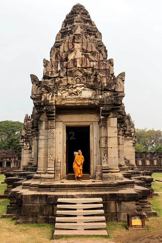 Monk at the entrance to the main portal