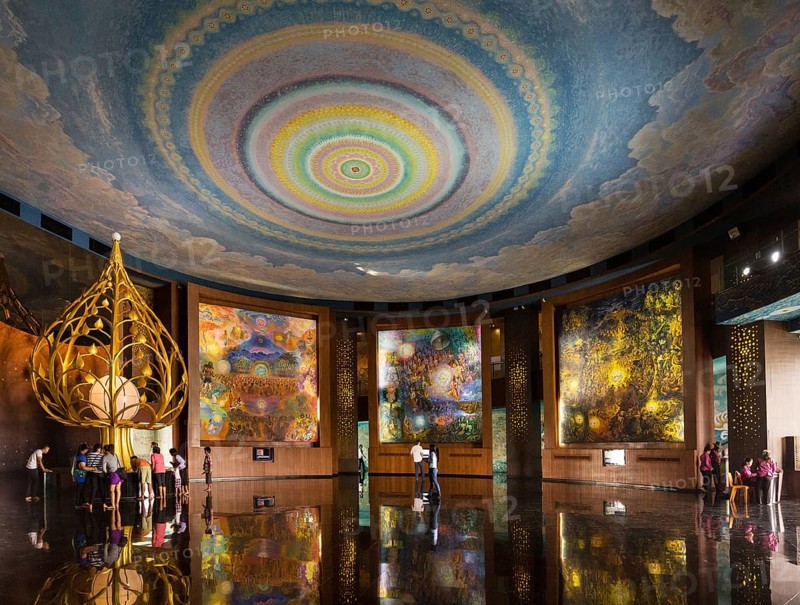Great Hall with golden lotus flower and giant wall paintings in the Elephant Temple Thep Wittayakhom Vihara