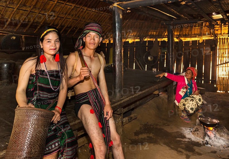 Phnong woman and man in traditional costume