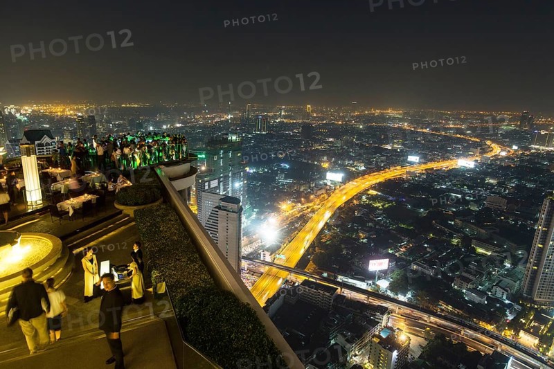 Guests at the Sky Bar on the Lebua State Tower with panoramic views