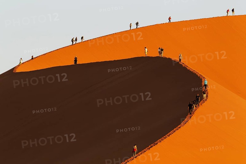 Tourists climbing Dune 45 in the Namib Desert
