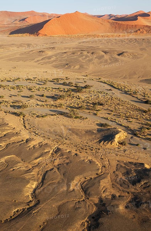 Arid plains and dry riverbed of the Tsauchab river at the edge of the Namib Desert