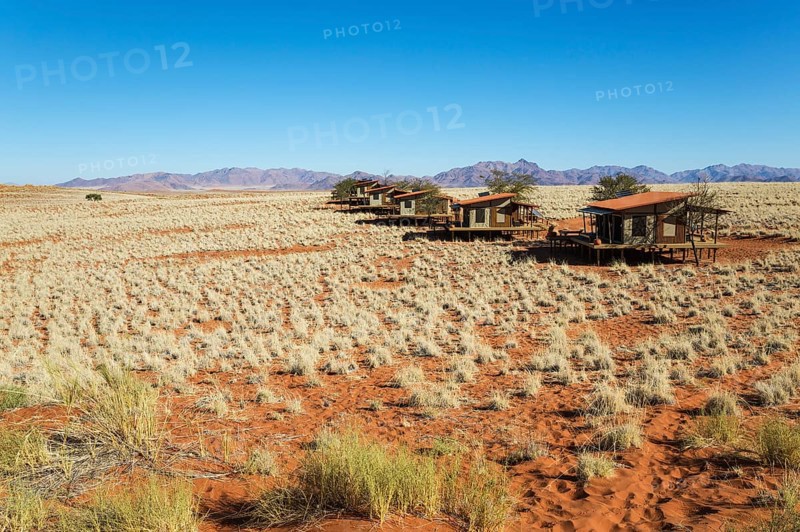 The chalets of the exclusive Wolwedans dunes lodge in a beautiful desert setting at the edge of the Namib Desert
