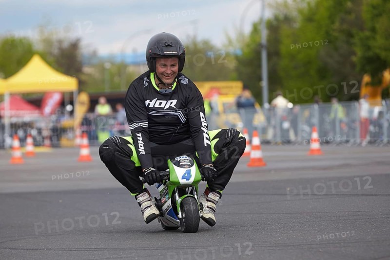 Motorcycle stuntman Mike Auffenberg on a minibike during the ADAC motorbike startup day