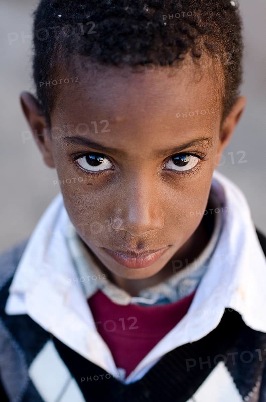 Boy looking up with big eyes