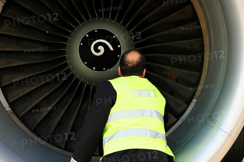 Pilot checking engine