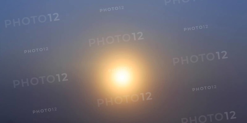 Sun penetrate through fog
