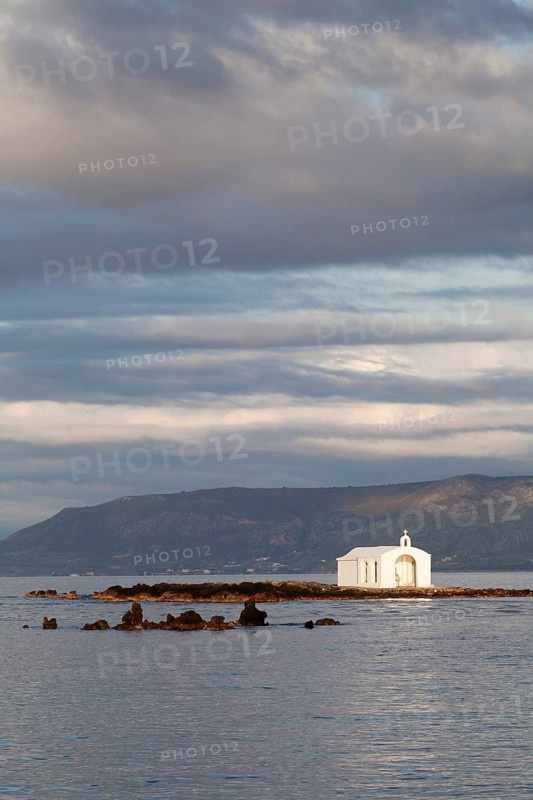 Chapel on a cliff in the sea