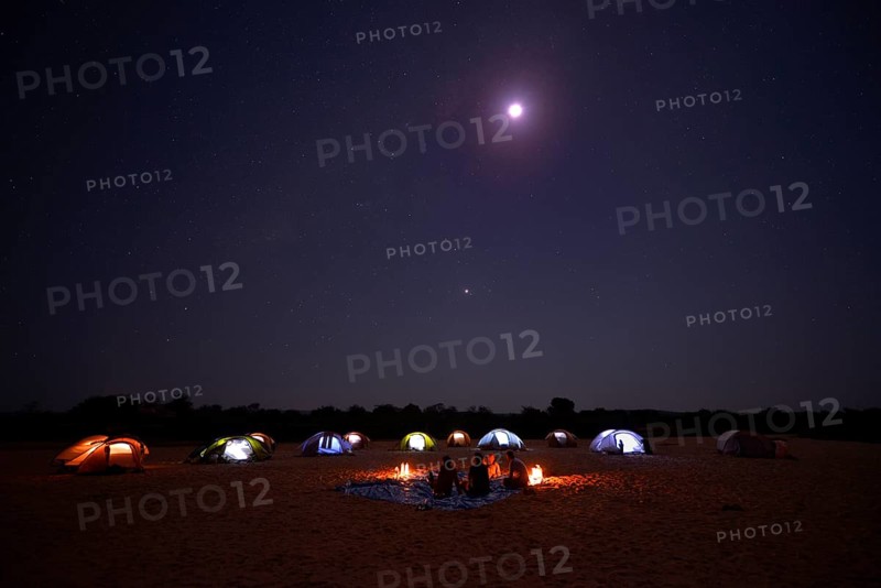 A camp on the Tsiribihina River at night