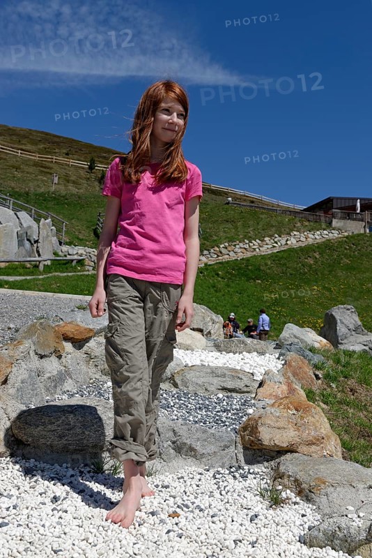 Girl on the barefoot path on the Watles Adventure Mountain