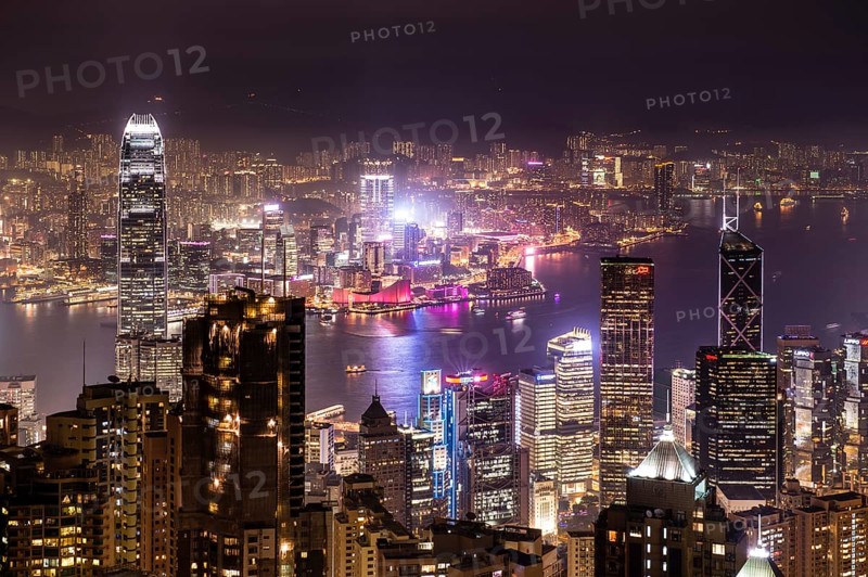 Panoramic view from Victoria Peak across the high-rise buildings at night