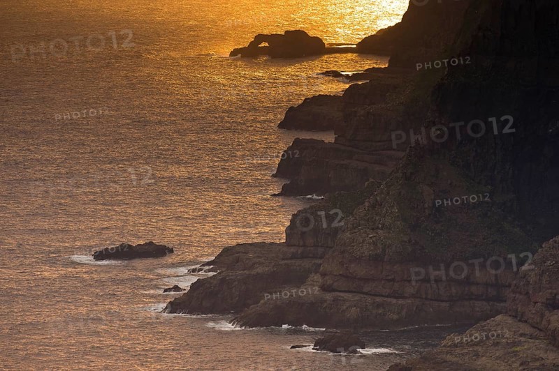 Cliffs and sea in evening light