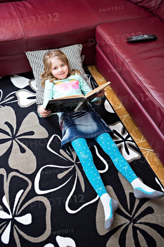 Girl reading at home