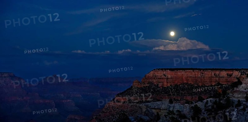 View of the Grand Canyon at night with full moon