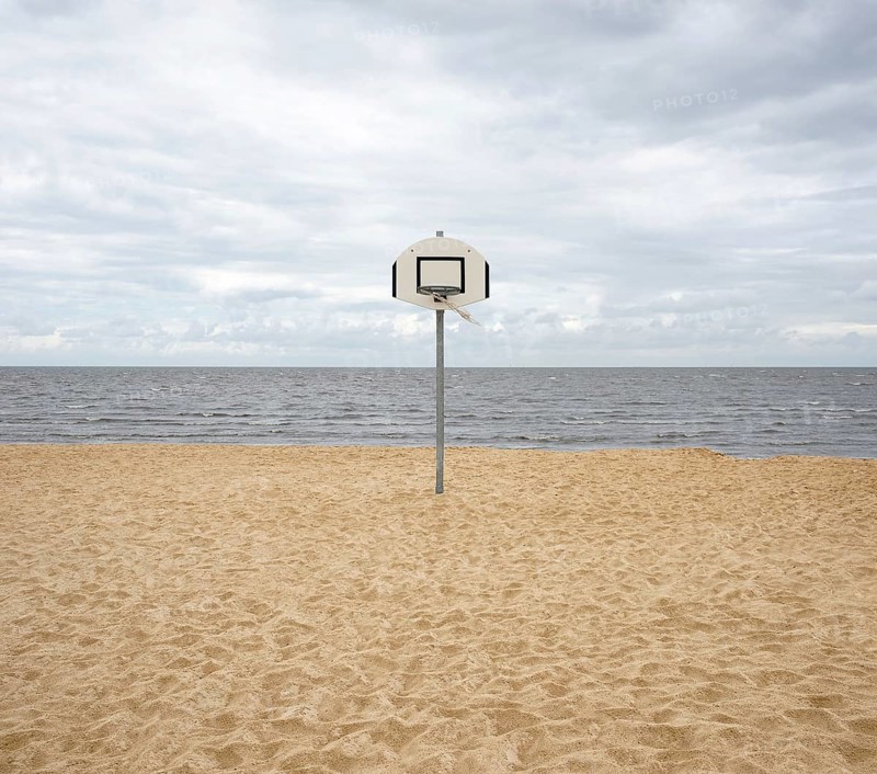 Basketball hoop on a deserted North Sea beach