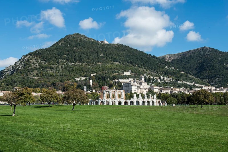 Historic town of Gubbio with Monte Ingino and the Roman theatre