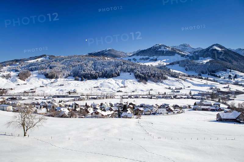 The village of Urnasch with Mt Alpstein