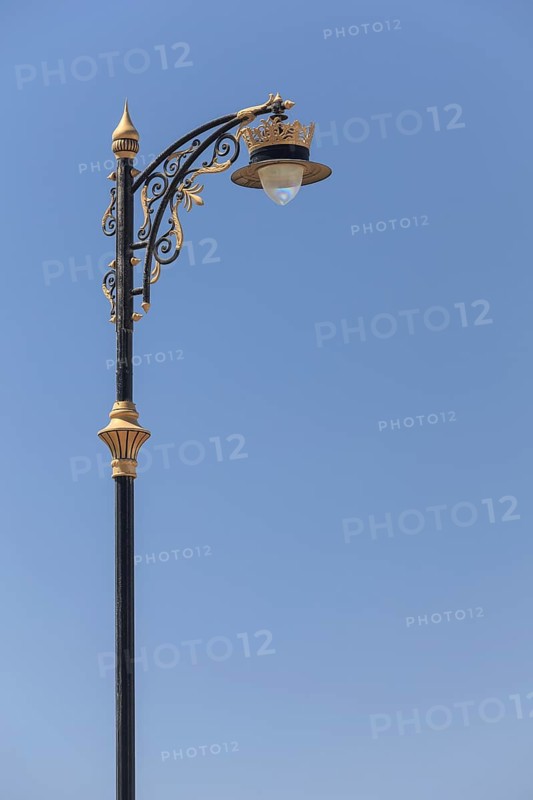 Street lamp with golden ornaments