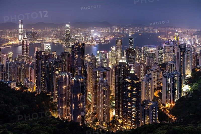 Panoramic view from Victoria Peak across the high-rise buildings at night