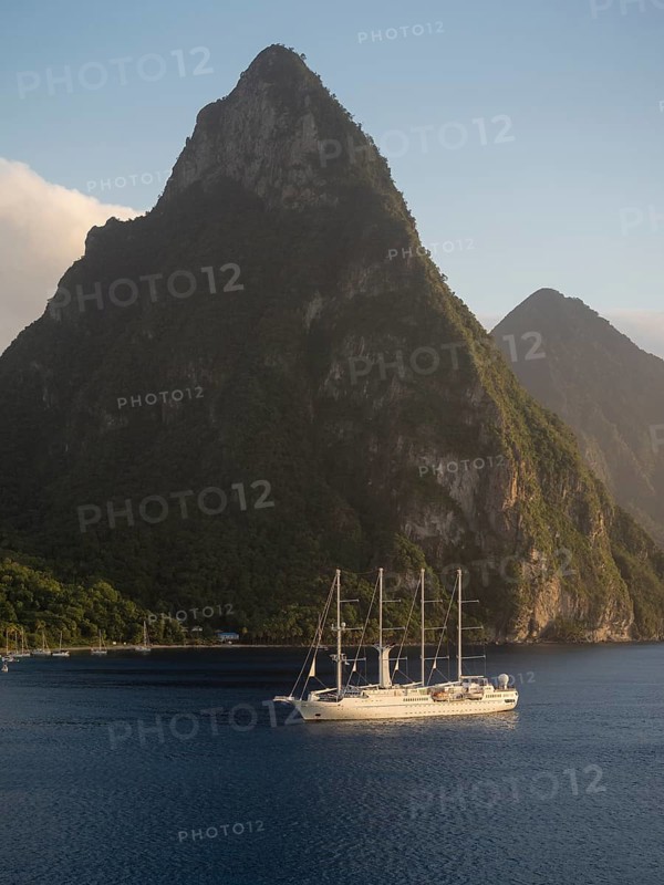 Sailing cruise ship Wind Star of Windstar Cruises in front of the volcanoes Gros Piton and Petit Piton