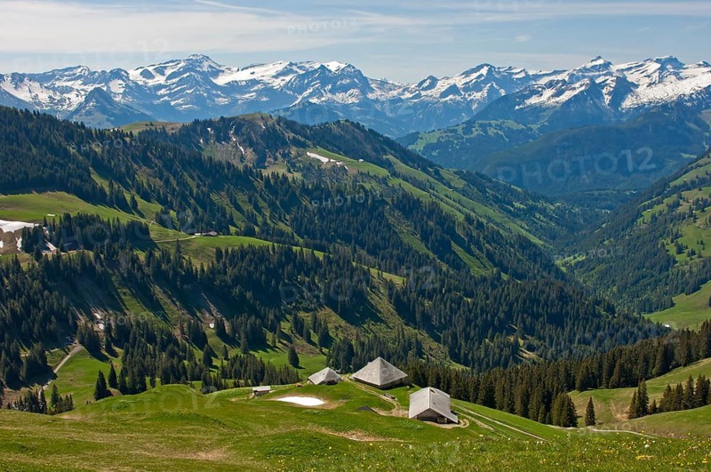 Pre-alpine landscape with alpine cabins
