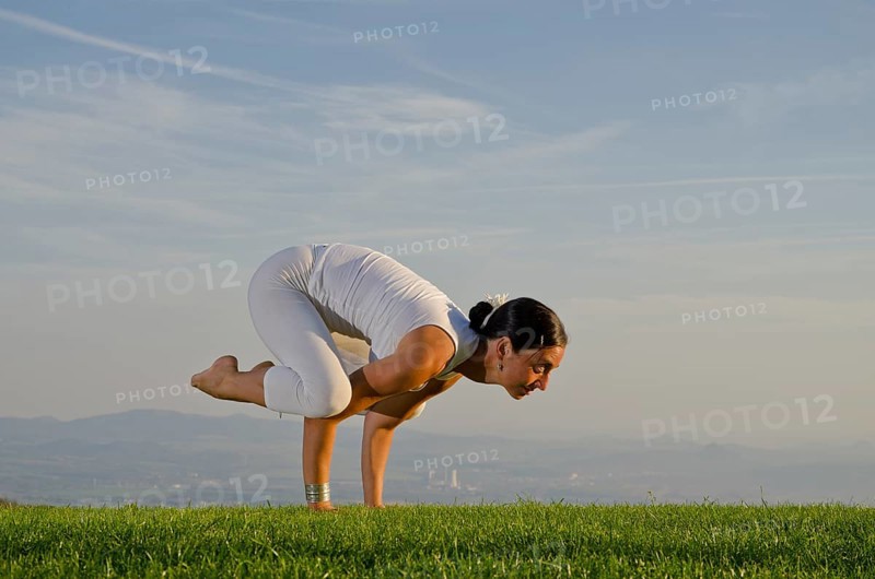 Young woman practising Hatha yoga