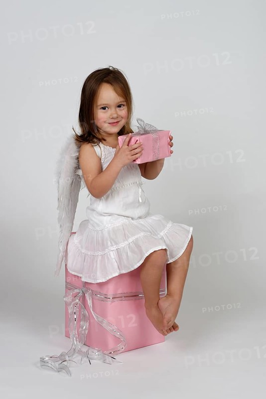 Girl dressed as angel