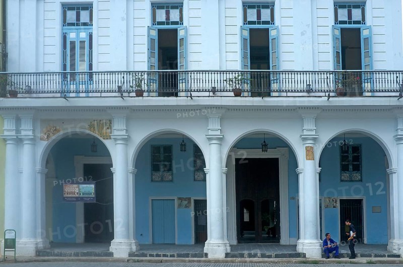 Blue house facade with a front porch