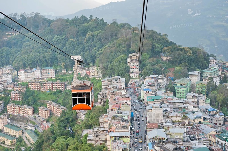 Gondola of a cable car and the town of Gangtok