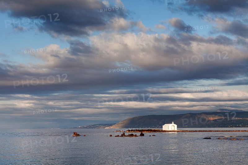 Chapel on a cliff in the sea