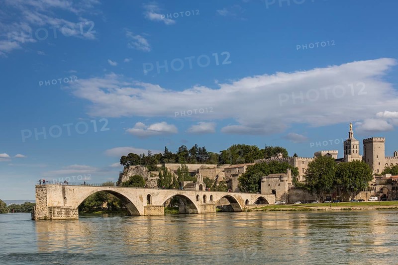 The historic bridge of Avignon with the papal palace in the background