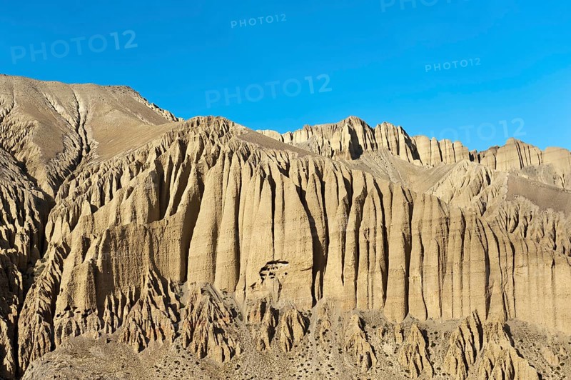 Bizarre erosion landscape with prehistoric caves in the rocks