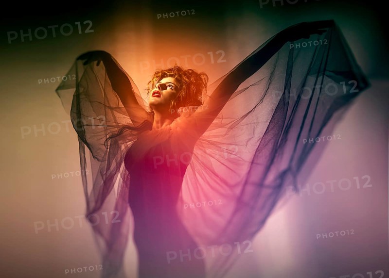 Young woman with wing veil