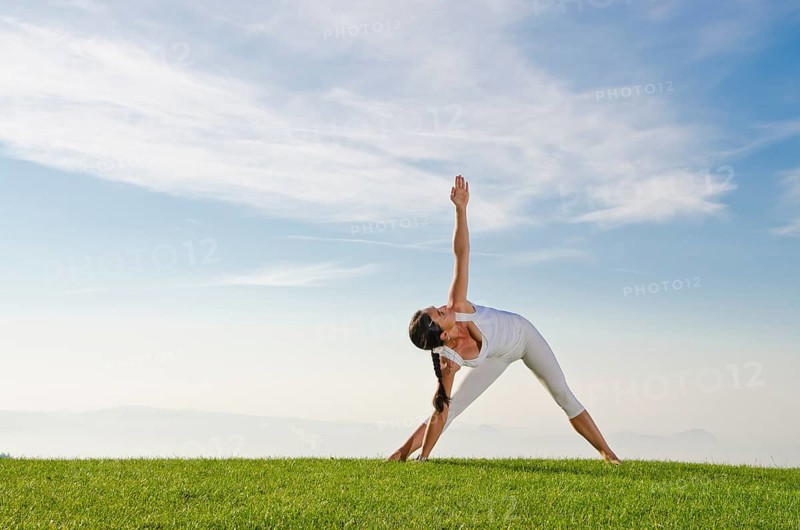 Young woman practising Hatha yoga