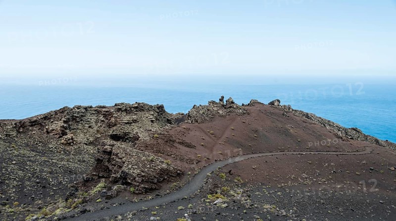 Hiking trail through a lava landscape