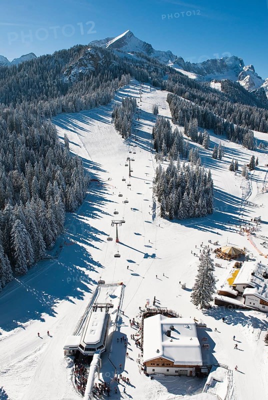 Skiers on Hausberg Mountain