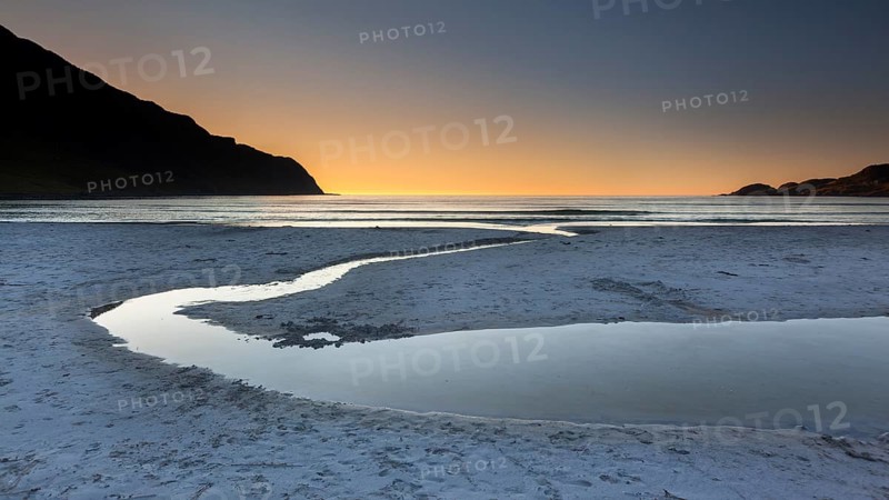 Refviksanden Beach with estuary in the evening light