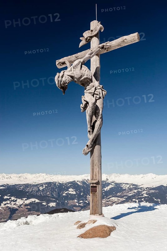 Summit cross on the Rasciesa above Ortisei in Val Gardena