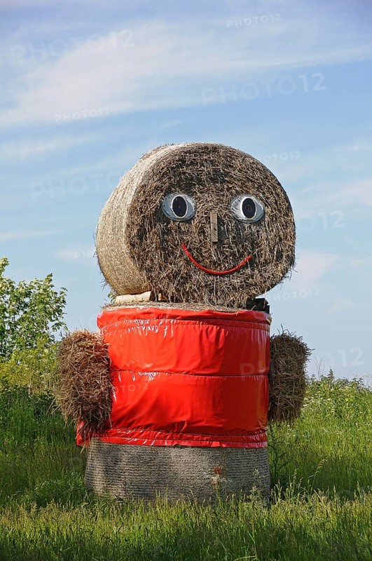 Straw doll made of straw bales