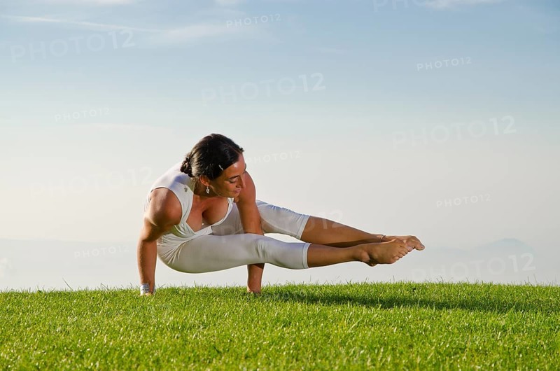 Young woman practising Hatha yoga