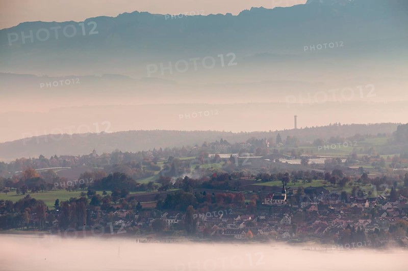 Fog over Uberlingersee lake and Dingelsdorf